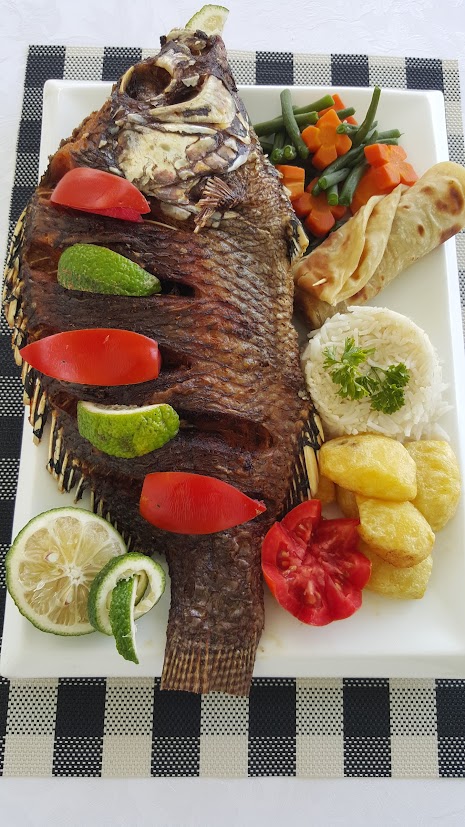 Grilled tilapia from Lake Victoria served in Entebbe
